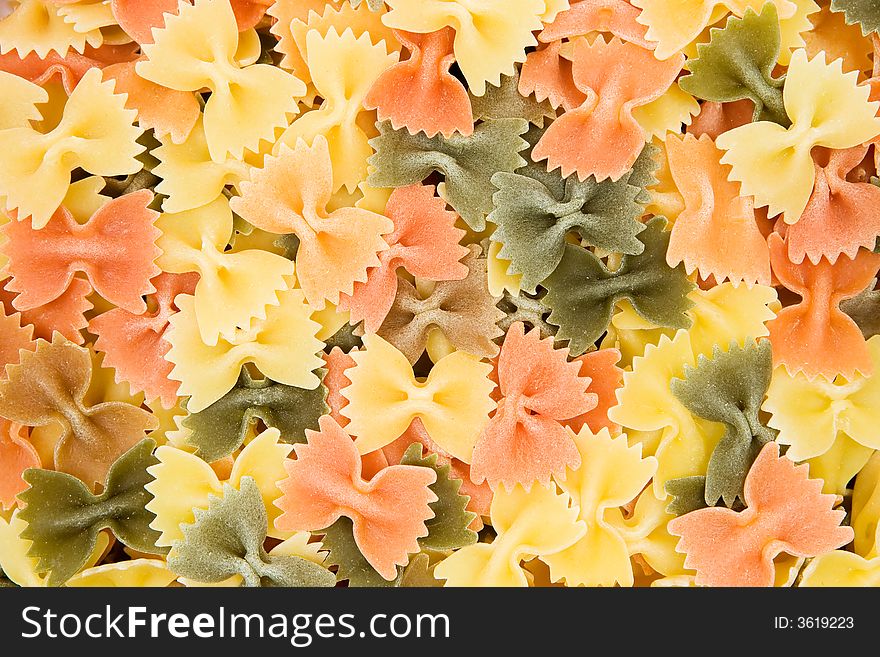 Colored pasta forming a appetizingly background. Colored pasta forming a appetizingly background.