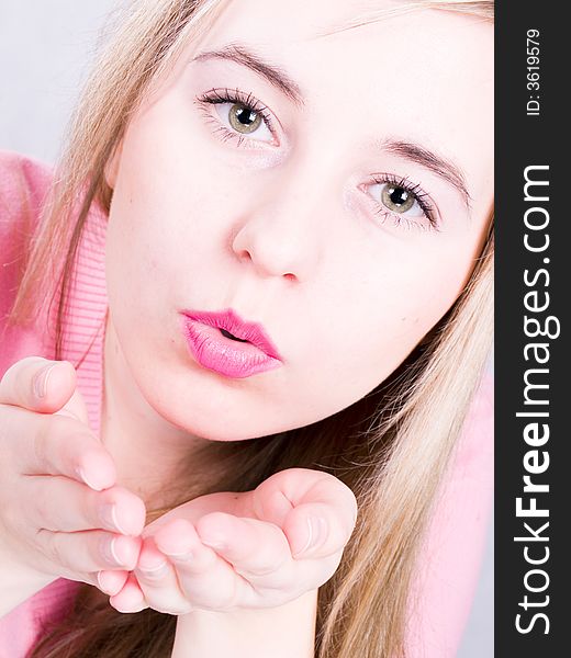 Girl blowing a kiss