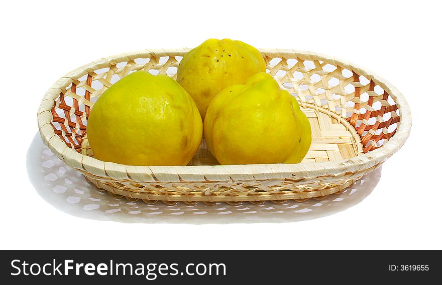 Three quinces in a basket