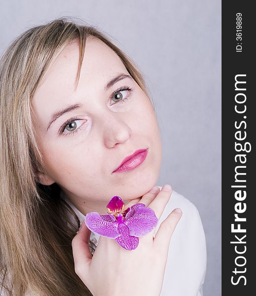 Blonde Woman With Orchid