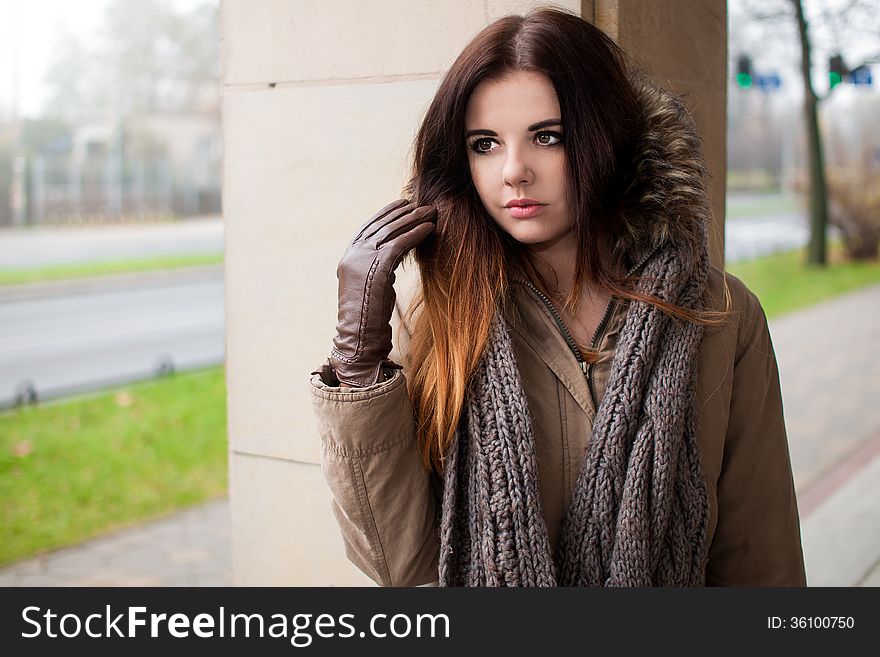 Beautiful brunette in peanut autumn coat. Beautiful brunette in peanut autumn coat