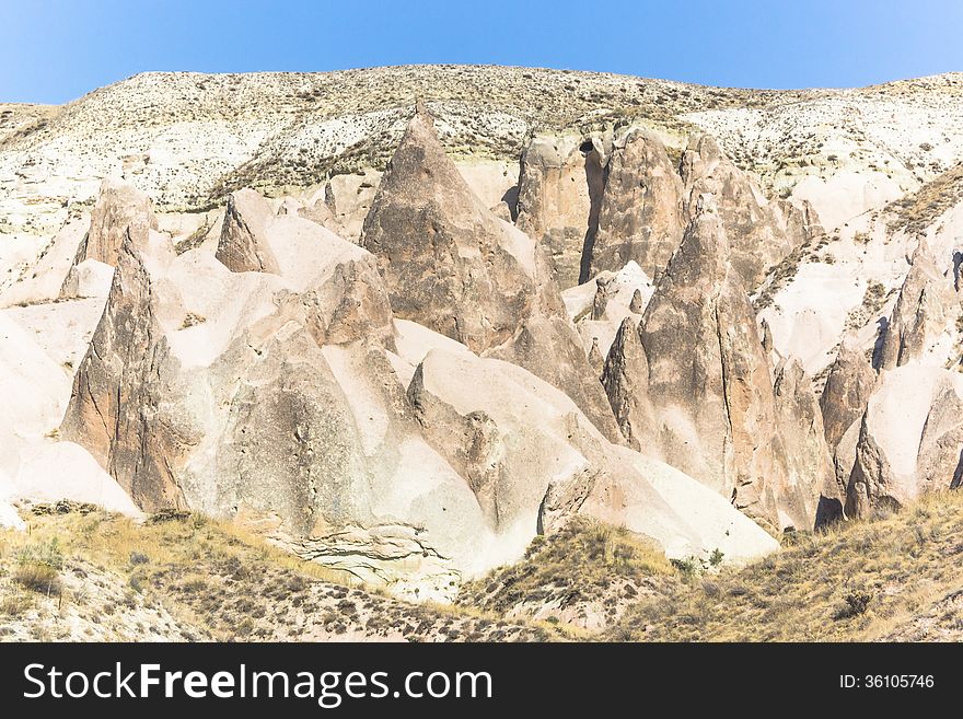 Warm Glow of Sunset on the Fairy Chimneys of Cappadocia, Popular Travel Destination in Central Turkey. Warm Glow of Sunset on the Fairy Chimneys of Cappadocia, Popular Travel Destination in Central Turkey