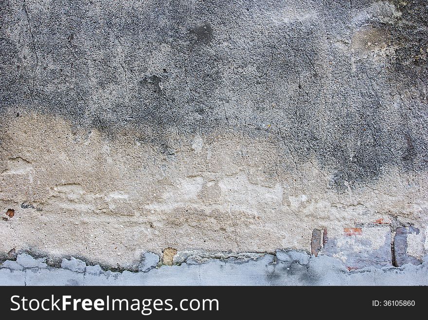 This is gray deep uneven plastered wall. This is gray deep uneven plastered wall