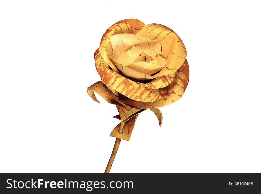 Rose flower made of birch bark isolated on white background