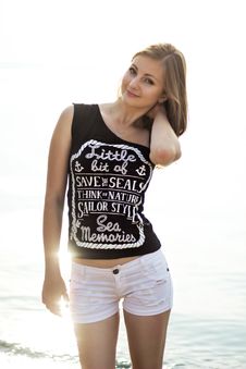 Happy Woman Standing On The Sunny Sea Beach Royalty Free Stock Photos Happy Woman Standing On The Sunny Sea Beach Royalty Free Stock Photos