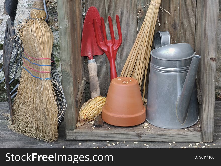 Equipment and gardening tools in a rustic setting