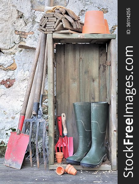 Equipment and gardening tools in a rustic setting