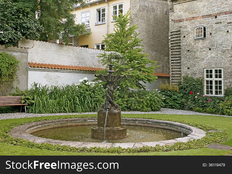 Courtyard with a fountain in a northern european town