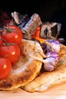 Composition With Bread, Tomatoes And Garlic Stock Image Composition With Bread, Tomatoes And Garlic Stock Image