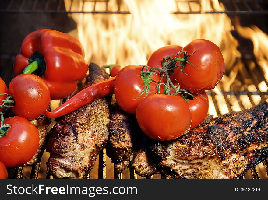 Pork Brisket In A Flame On BBQ  Grill