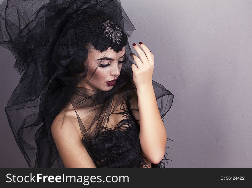 Portrait of young beautiful girl with black veil. Portrait of young beautiful girl with black veil