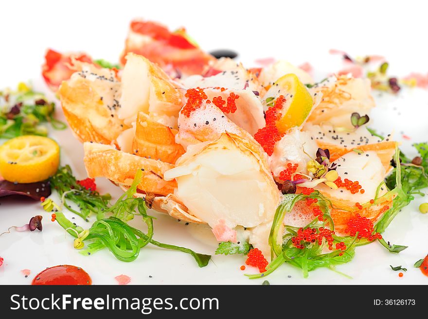 Lobster salad in japanese style with chuka seaweed and tobico