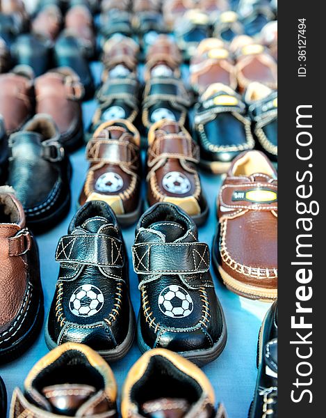 Rows Of Kids Shoes At A Swap Meet