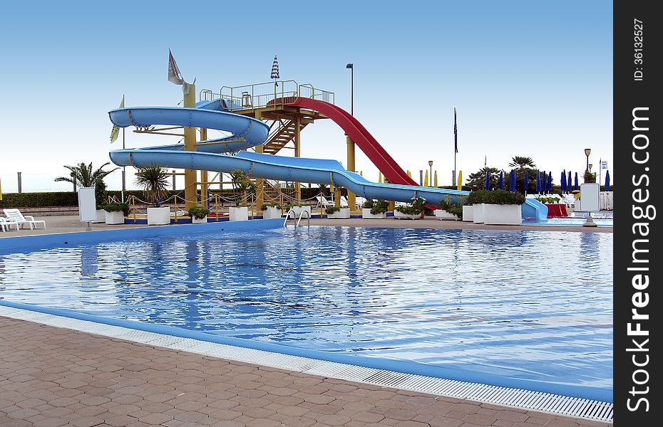 Outdoor pool with waterslides and aquafun. Outdoor pool with waterslides and aquafun