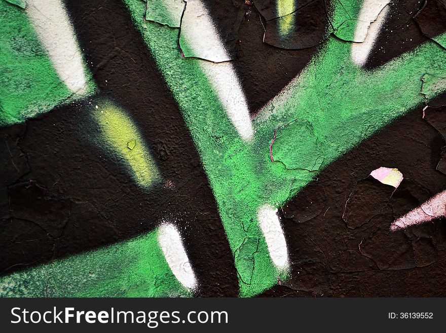 Detail of graffiti on a wall ideal for urban or grunge background. Detail of graffiti on a wall ideal for urban or grunge background.