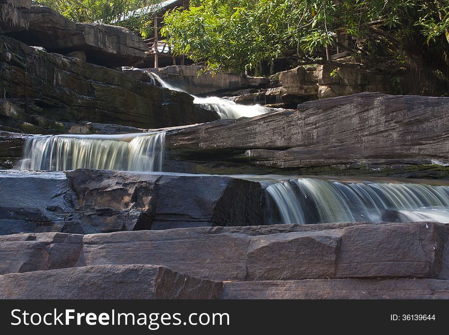 Waterfall river on the big dark rocks near Sihanoukville in Cambodia. Waterfall river on the big dark rocks near Sihanoukville in Cambodia