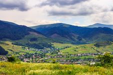 Light Beam Falls On Hillside With Autumn Village In Mountain Royalty Free Stock Image Light Beam Falls On Hillside With Autumn Village In Mountain Royalty Free Stock Image