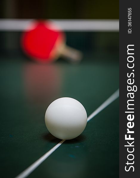 Table tennis racket and ball