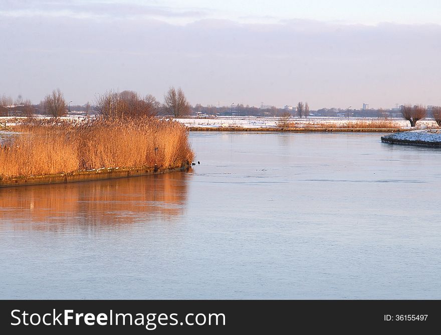 Frozen Eem river in Dutch Eempolder, Baarn, Netherlands
