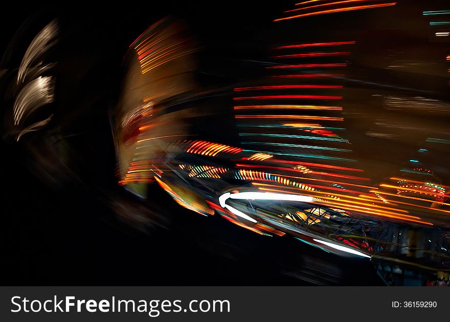 Ferris wheel in motion, Amusement park at night