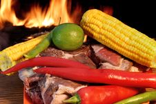 Fresh Rib Steak And Vegetables At The Flames Of Coal BBQ Facilit Royalty Free Stock Images Fresh Rib Steak And Vegetables At The Flames Of Coal BBQ Facilit Royalty Free Stock Images
