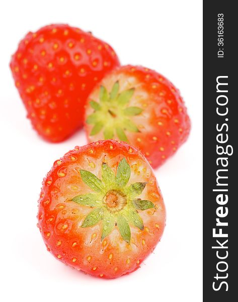 Heap of Three Ripe Strawberries isolated on white background. Heap of Three Ripe Strawberries isolated on white background