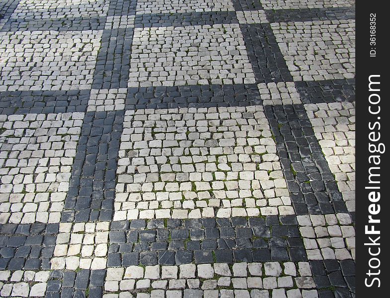 Cobblestone street with square pattern. Cobblestone street with square pattern