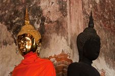 Golden Buddha Stute And Black Stute In Ancient Temple Of Thailand Royalty Free Stock Photo Golden Buddha Stute And Black Stute In Ancient Temple Of Thailand Royalty Free Stock Photo