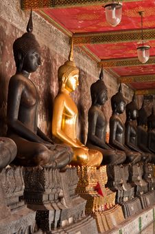 The Sitting Golden Buddha Stute And Black Stute In Ancient Temple Of Thailand Royalty Free Stock Photos The Sitting Golden Buddha Stute And Black Stute In Ancient Temple Of Thailand Royalty Free Stock Photos