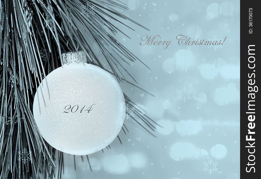 Merry Christmas postcard with simple decoration ball and blurred background. Merry Christmas postcard with simple decoration ball and blurred background
