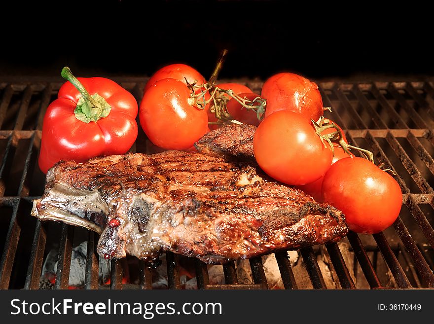 Tenderloin Steak On BBQ Grill With Vegetables