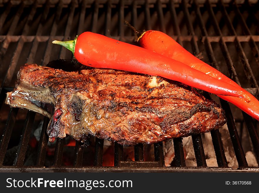 Rib Steak On BBQ Grill