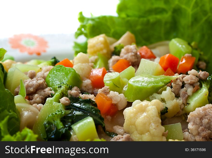 Rice noodles with pork and vegetable in thick sauce