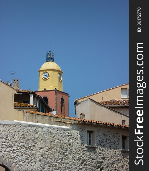 Tower of the church in Saint Tropez and blue sky.