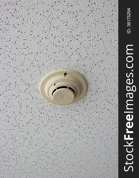 Smoke detector on a ceiling in office