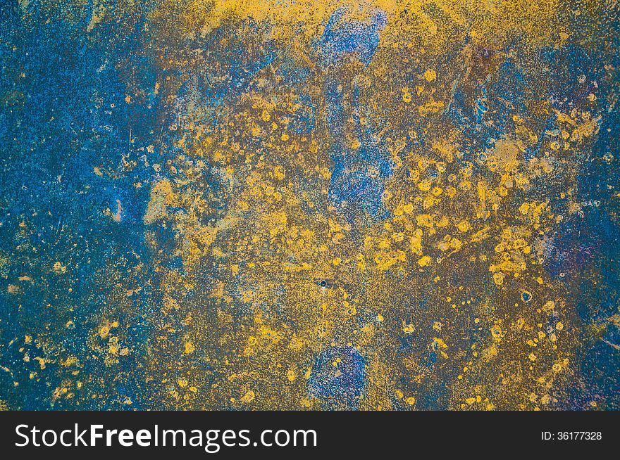 The rusty metal plate as colorful background. The rusty metal plate as colorful background