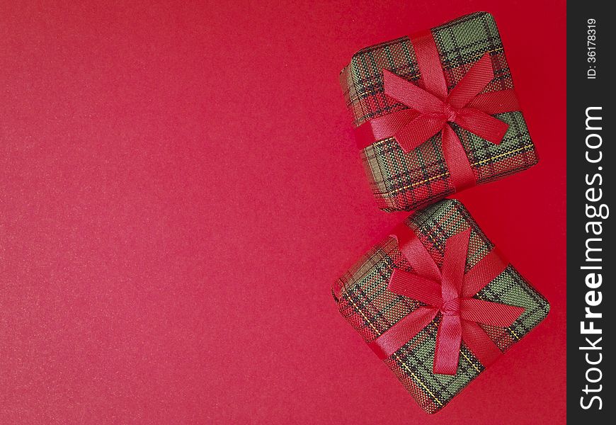 Pair of red gift box decorate on red background. Pair of red gift box decorate on red background