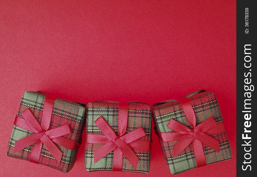 Three of red gift box decorate on red background. Three of red gift box decorate on red background