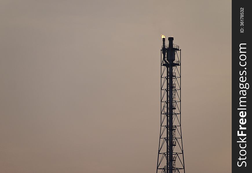 High tower distillation of refinery in twilight sky. High tower distillation of refinery in twilight sky