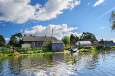 Russian Wooden Houses At River Bank Royalty Free Stock Photos Russian Wooden Houses At River Bank Royalty Free Stock Photos