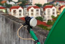Satellite Receiver Dish Is Green An Roof. Stock Photo Satellite Receiver Dish Is Green An Roof. Stock Photo