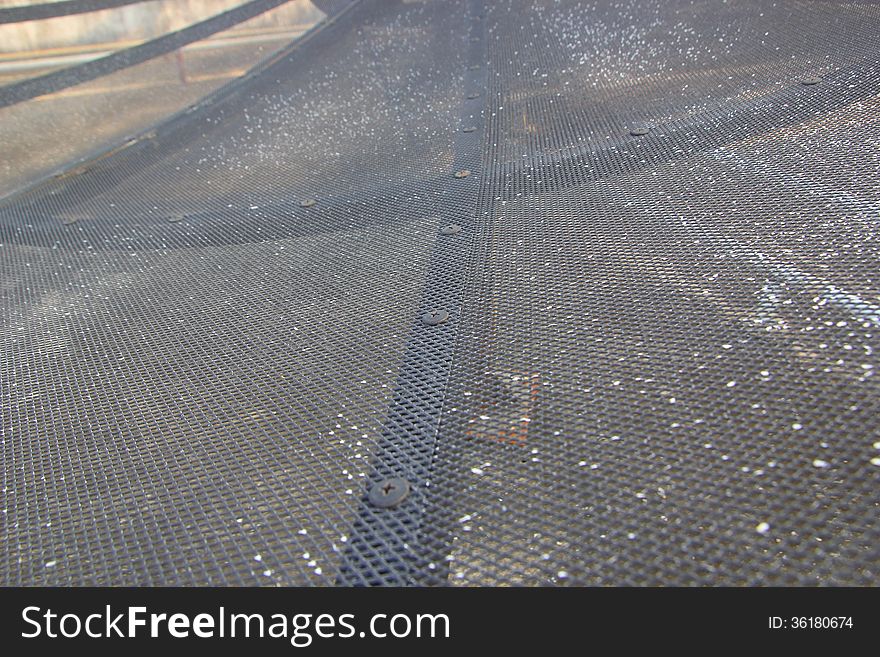 Closeup a mesh satellite dish.