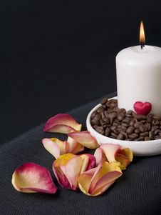 Candle, Coffee Beans And Petals Of Rose Royalty Free Stock Photography