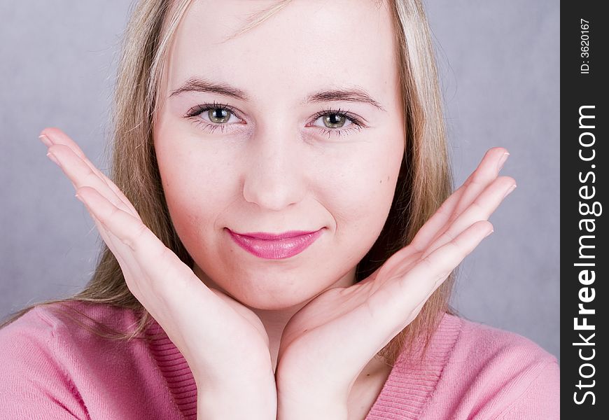 An attractive blonde smiling girl