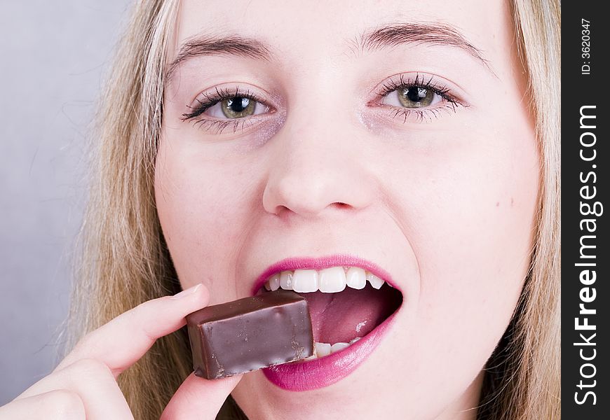 Girl Eating Chocolate