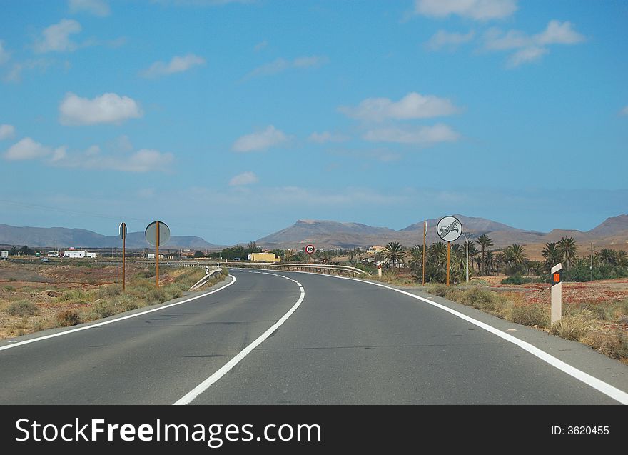Empty street in the mountains, Fuerteventura. Empty street in the mountains, Fuerteventura.