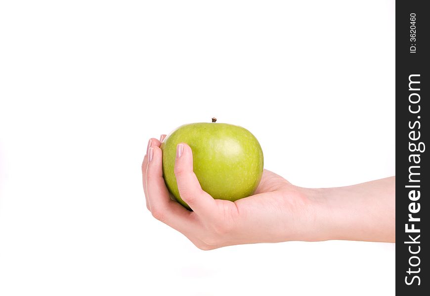 Woman holding a green apple in her hand. Woman holding a green apple in her hand
