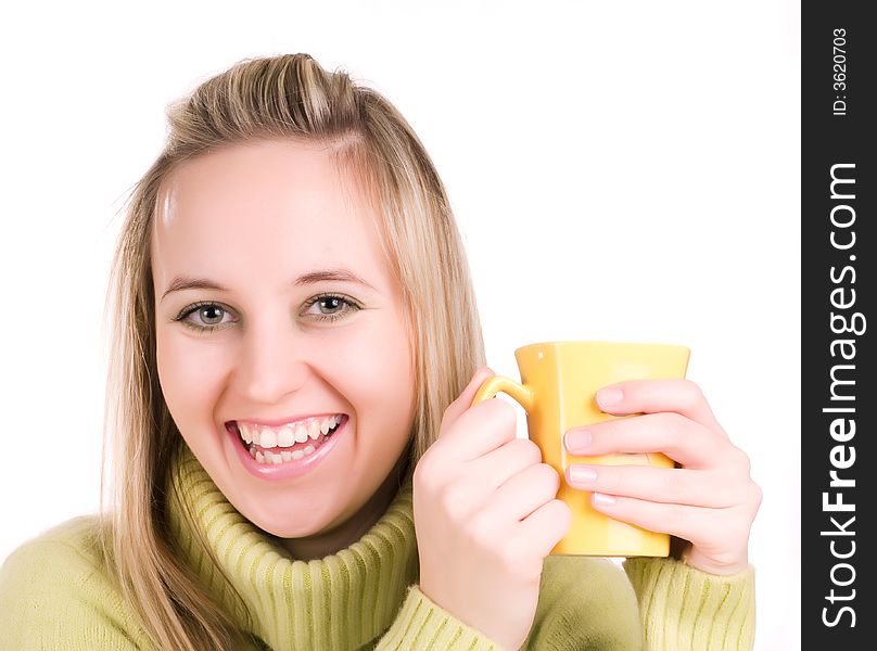 Smilling young woman with cup of tea
