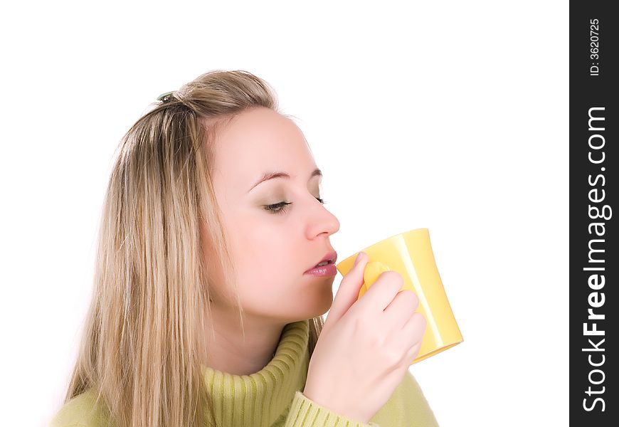 Young woman drinking hot tea