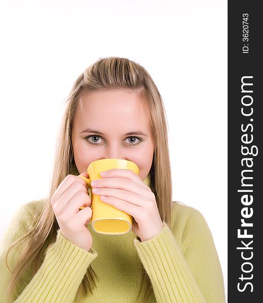 Young woman drinking hot tea